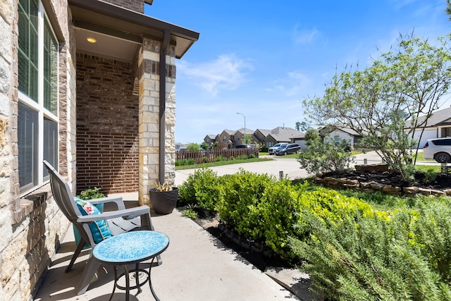 12420 Southern Trail Ct, Magnolia, TX 77354 - view of patio / terrace featuring a residential view