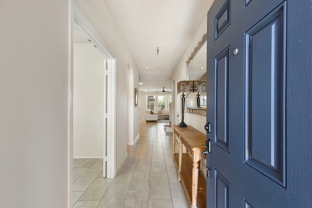 12420 Southern Trail Ct, Magnolia, TX 77354 - hall featuring light tile patterned flooring and baseboards