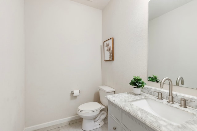 12420 Southern Trail Ct, Magnolia, TX 77354 - bathroom featuring toilet, tile patterned floors, vanity, and baseboards