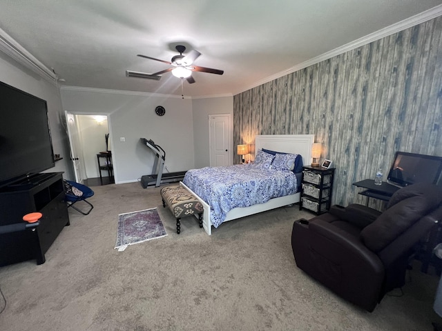 carpeted bedroom featuring visible vents, ornamental molding, and ceiling fan