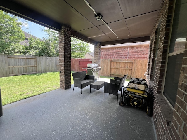 view of patio featuring a fenced backyard, an outdoor living space, and a grill