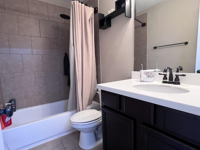 full bath with tile patterned flooring, shower / tub combo, toilet, and vanity
