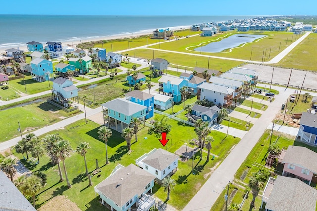 11213 Schwartz Dr, Galveston, TX 77554 - drone / aerial view with a view of the beach, a residential view, and a water view