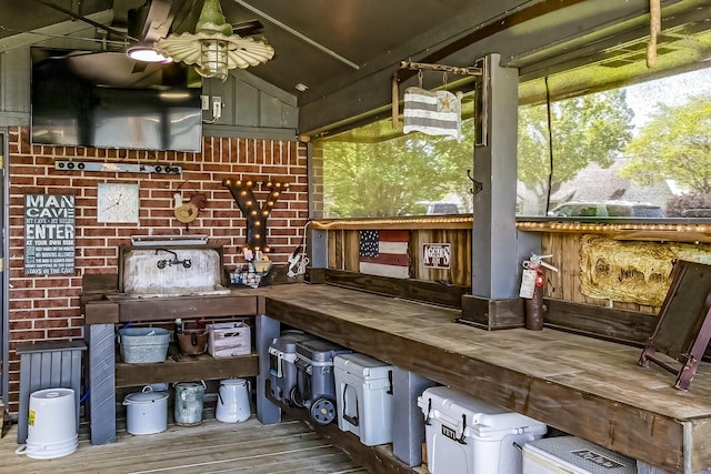 storage featuring ceiling fan