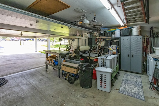 garage with a ceiling fan