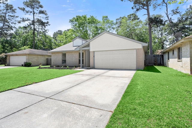 17311 Lowick St, Spring, TX 77379 - ranch-style house with driveway, brick siding, and an attached garage