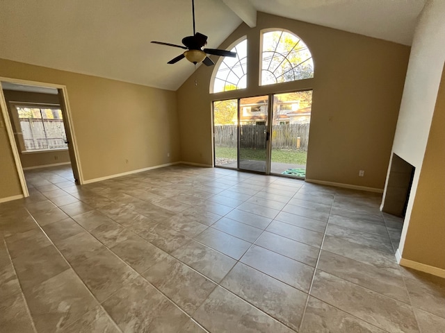 spare room featuring baseboards, tile patterned flooring, beamed ceiling, ceiling fan, and high vaulted ceiling