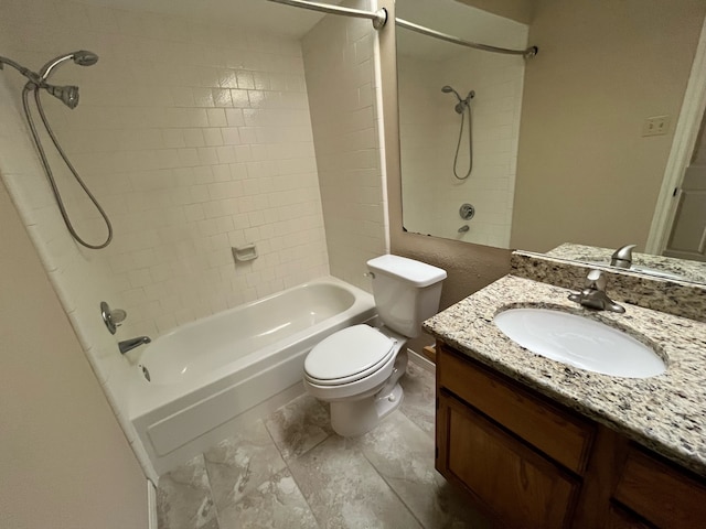full bath featuring washtub / shower combination, vanity, and toilet