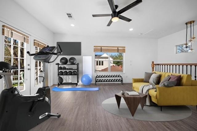 workout room with visible vents, a ceiling fan, recessed lighting, wood finished floors, and french doors