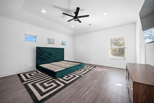 unfurnished bedroom featuring ceiling fan, visible vents, recessed lighting, baseboards, and dark wood-style floors