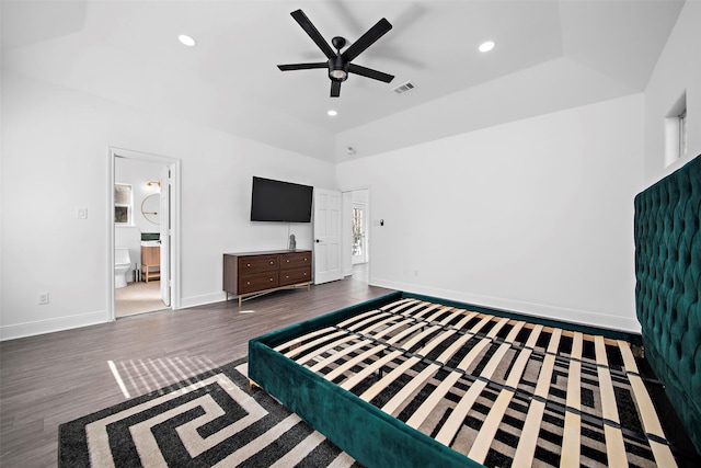 unfurnished bedroom with visible vents, baseboards, ensuite bathroom, recessed lighting, and dark wood-type flooring
