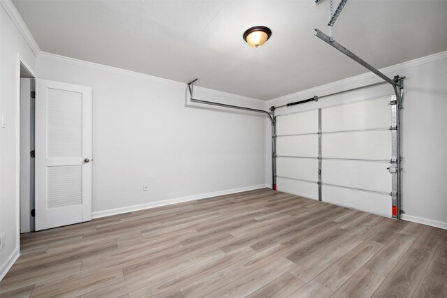 garage featuring baseboards