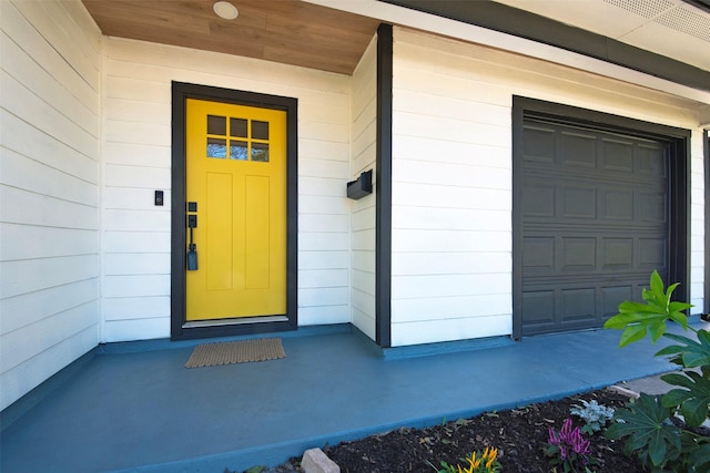 entrance to property with a garage