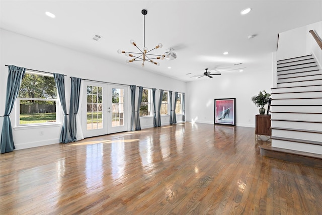 unfurnished living room featuring recessed lighting, stairs, and visible vents
