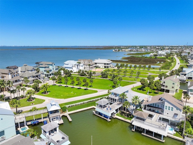 birds eye view of property featuring a residential view and a water view