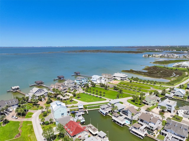 aerial view with a water view and a residential view