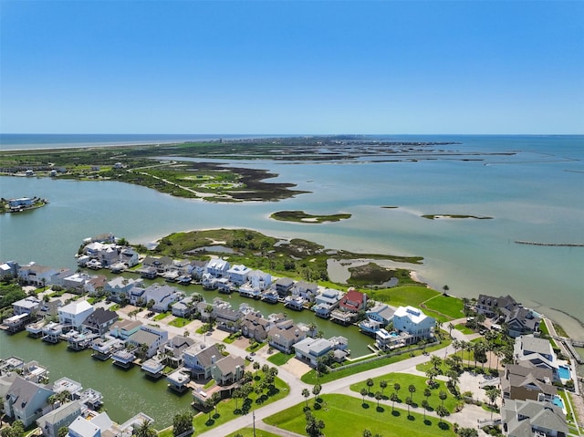 birds eye view of property with a water view and a residential view