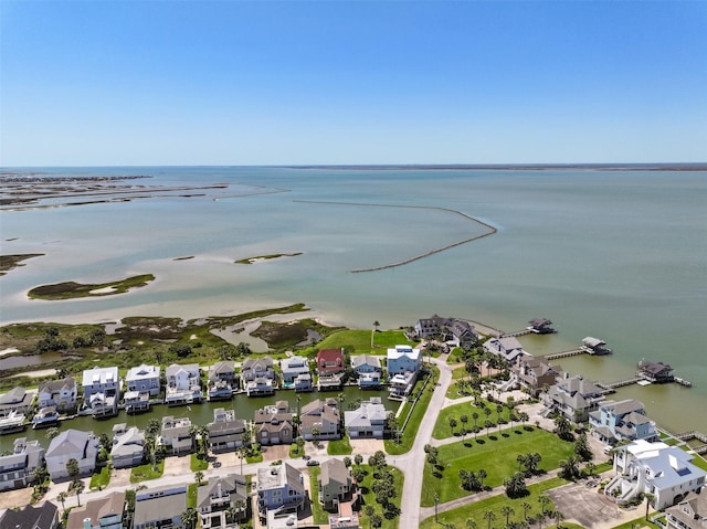 birds eye view of property with a residential view and a water view