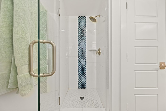 full bathroom featuring a stall shower
