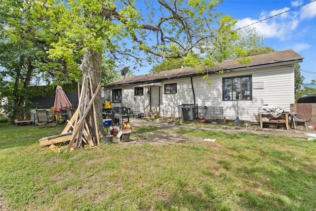 6109 Wayland St, Houston, TX 77021 - back of house featuring a lawn and entry steps
