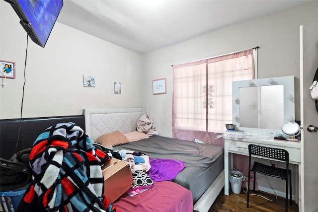 6109 Wayland St, Houston, TX 77021 - bedroom featuring multiple windows and wood finished floors
