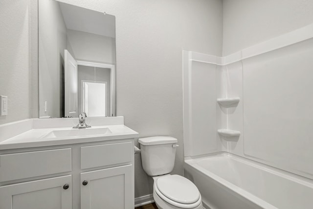 full bathroom featuring toilet,  shower combination, and vanity