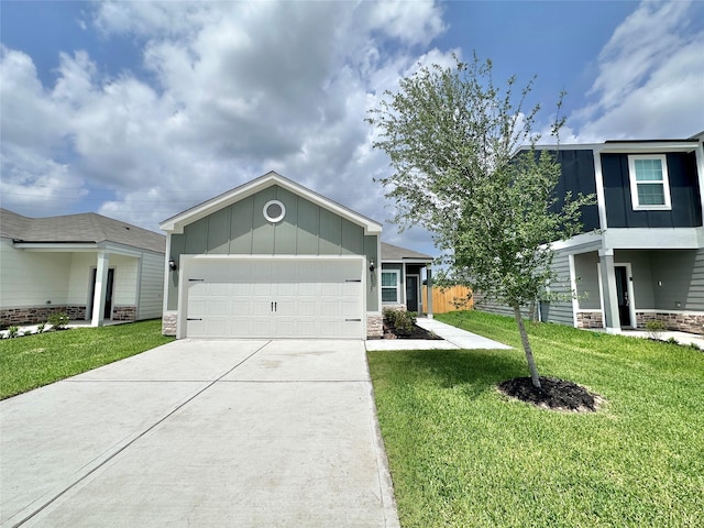 single story home featuring concrete driveway, board and batten siding, an attached garage, and stone siding