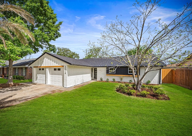 ranch-style house featuring a front lawn, fence, brick siding, an attached garage, and board and batten siding