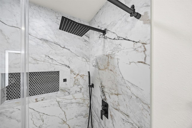 room details with a marble finish shower
