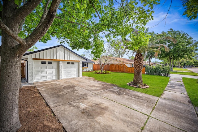 exterior space featuring fence and concrete driveway