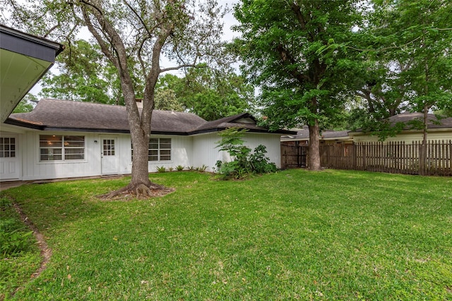 view of yard with fence