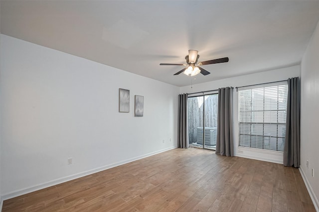 1904 Portsmouth St, Houston, TX 77098 - empty room featuring wood finished floors, ceiling fan, and baseboards