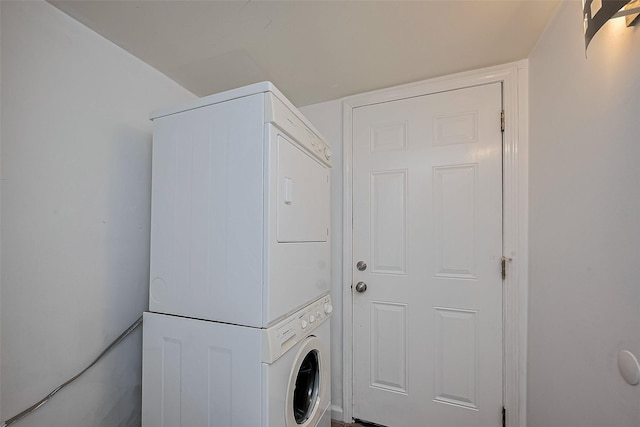 1904 Portsmouth St, Houston, TX 77098 - washroom featuring stacked washer / drying machine and laundry area