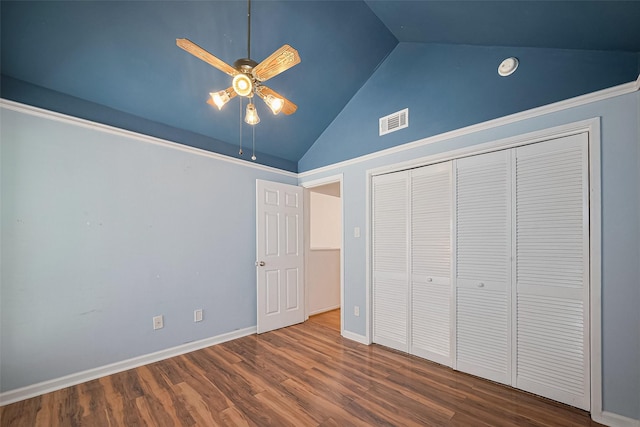 1904 Portsmouth St, Houston, TX 77098 - unfurnished bedroom featuring a closet, baseboards, a ceiling fan, visible vents, and wood finished floors