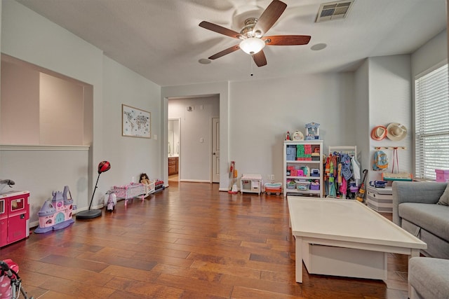 recreation room featuring a ceiling fan and wood-type flooring