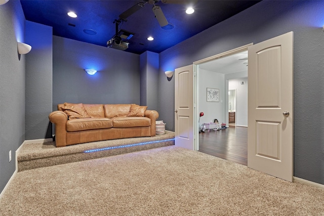carpeted cinema featuring ceiling fan, recessed lighting, and baseboards