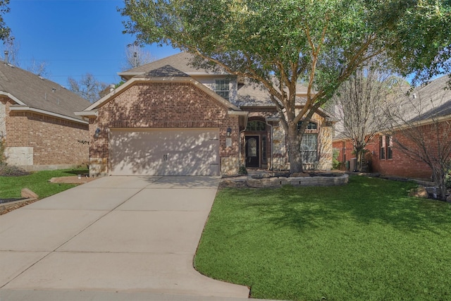 traditional home featuring an attached garage, a front lawn, brick siding, and driveway