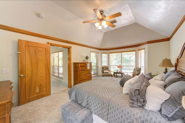 bedroom featuring lofted ceiling, light carpet, crown molding, visible vents, and ceiling fan