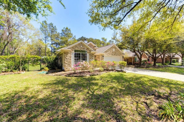 ranch-style home with a garage, fence, stone siding, a front lawn, and concrete driveway