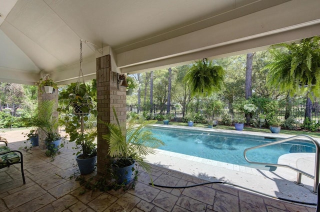 outdoor pool with a patio