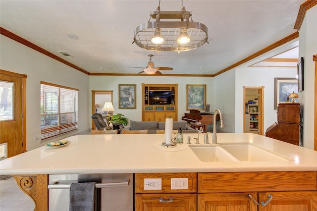 24501 Sable Creek Ct, Porter, TX 77365 - kitchen featuring open floor plan, a sink, light countertops, and crown molding