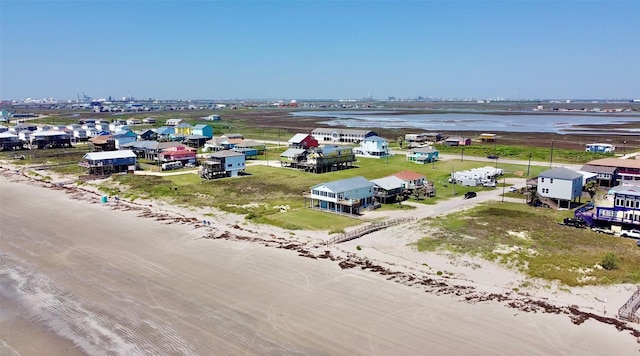 101 Saltgrass Ave, Surfside Beach, TX 77541 - birds eye view of property with a beach view and a water view