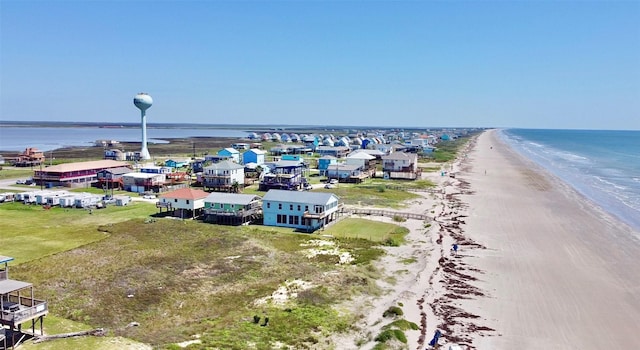 101 Saltgrass Ave, Surfside Beach, TX 77541 - drone / aerial view featuring a view of the beach and a water view