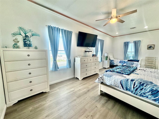 101 Saltgrass Ave, Surfside Beach, TX 77541 - bedroom featuring light wood-style flooring, baseboards, ornamental molding, and visible vents