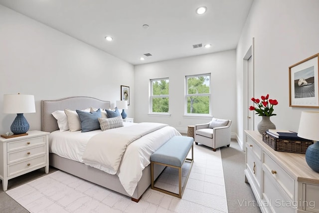 2015 Brackenridge St Unit A, Houston, TX 77026 - bedroom with light carpet, recessed lighting, and baseboards