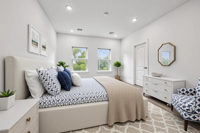 2015 Brackenridge St Unit A, Houston, TX 77026 - bedroom featuring wood finished floors and recessed lighting