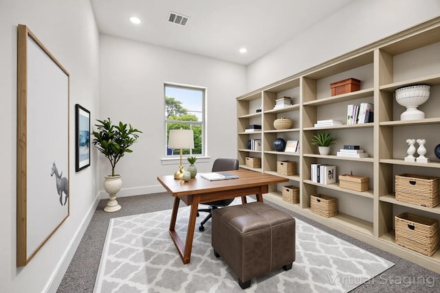 2015 Brackenridge St Unit A, Houston, TX 77026 - home office featuring light colored carpet, baseboards, and recessed lighting
