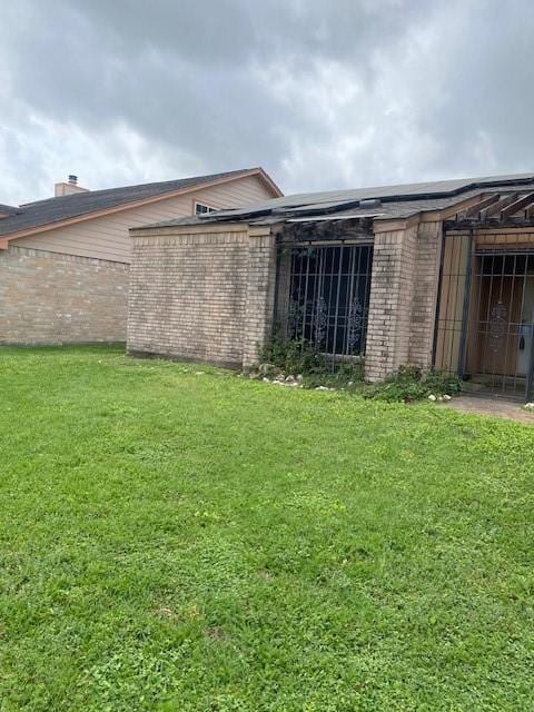 12207 Mckamy Dr, Houston, TX 77067 - view of side of home featuring brick siding