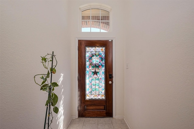 5819 Southern Rose Ln, Rosenberg, TX 77469 - foyer entrance featuring light tile patterned floors and a healthy amount of sunlight