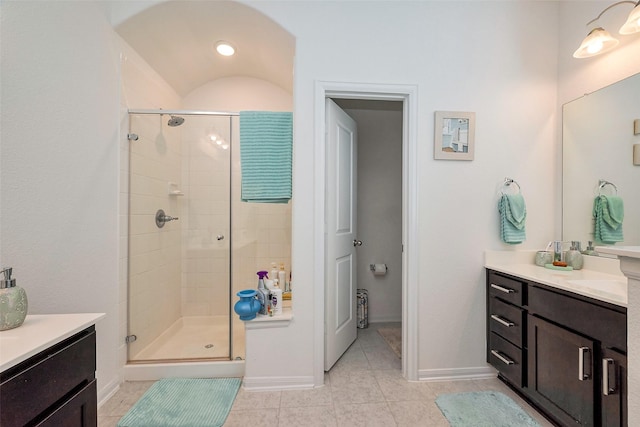 5819 Southern Rose Ln, Rosenberg, TX 77469 - full bath featuring a shower stall, vanity, baseboards, and tile patterned flooring